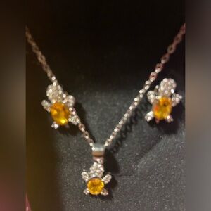 Ss three peas, earring, and necklace set could be for November birthstone color